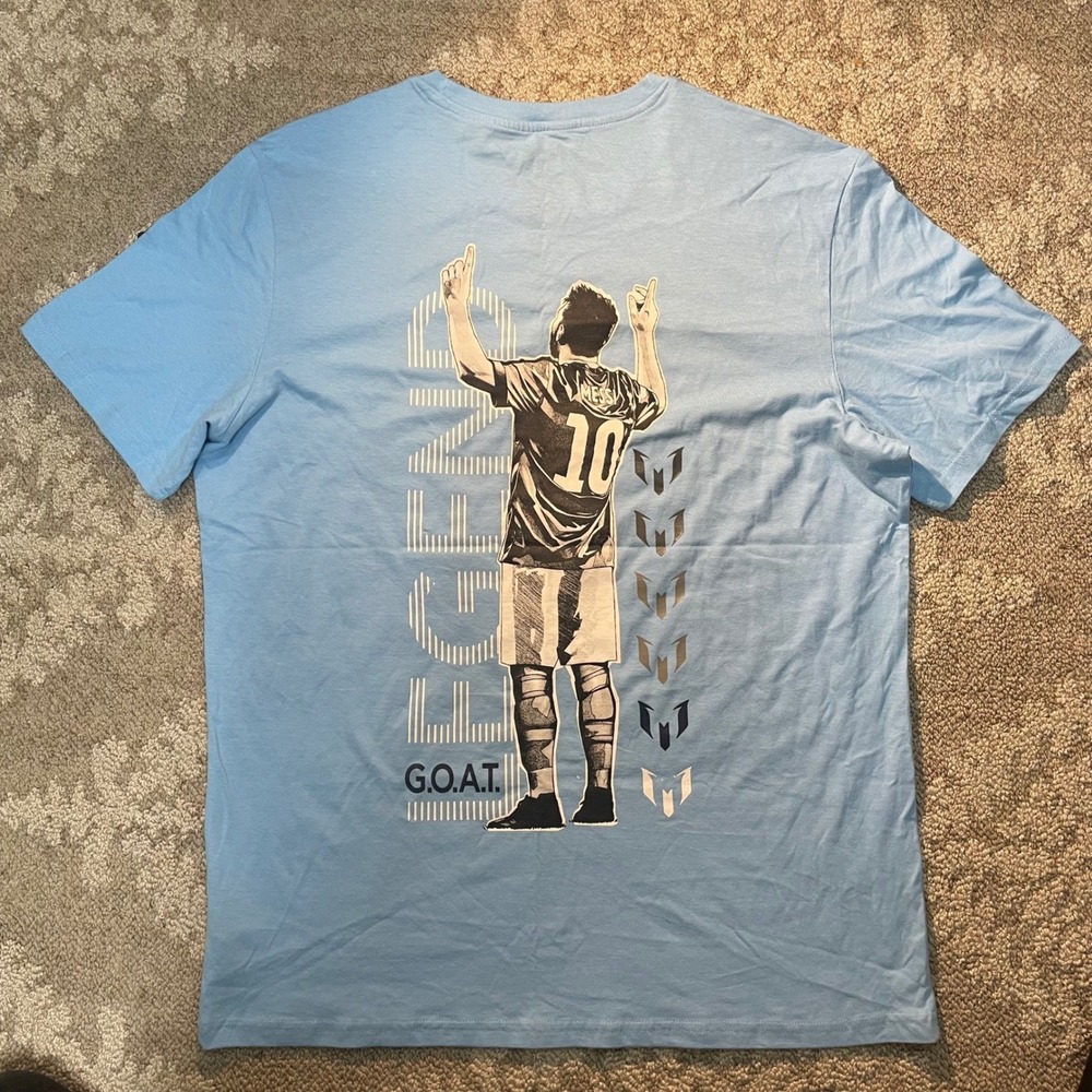 Messi Collection T-Shirt Mens Large Air Blue Legend GOAT Graphic MSM0032USJ NWT - Picture 2 of 7